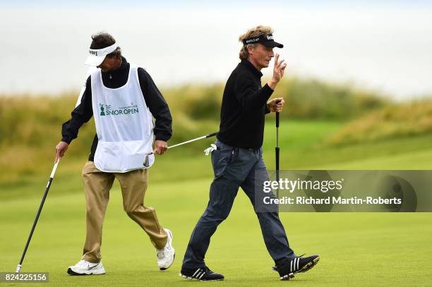 Bernhard Langer of Germany acknowledges the crowd on the 2nd green during the third round of the Senior Open Championship presented by Rolex at Royal...