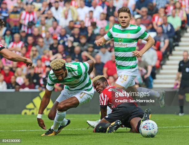 Didier N'Dong of Sunderland goes down after a challenge from Scott Sinclair during a pre-season friendly match between Sunderland AFC and Celtic at...