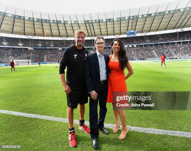 Jurgen Klopp manager of Liverpool with owners John W Henry and Linda Pizzuti Henry before the preseason friendly match between Hertha BSC and FC...