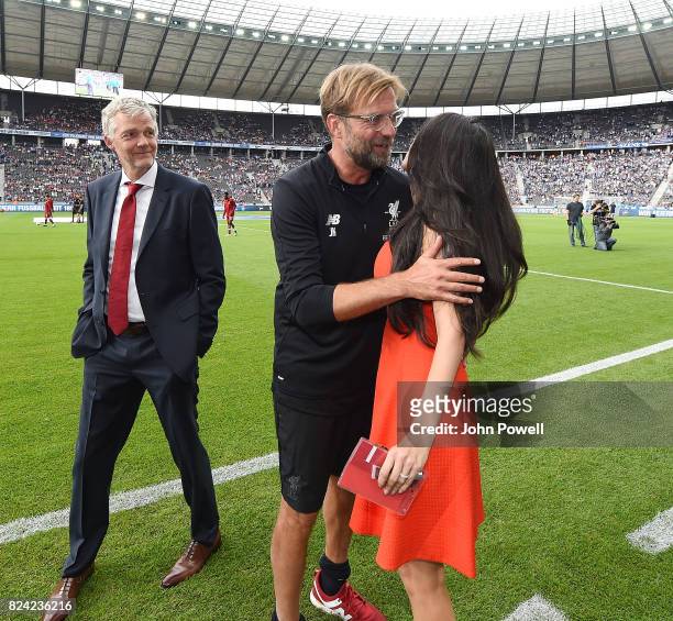Jurgen Klopp manager of Liverpool with owner Linda Pizzuti Henry before the preseason friendly match between Hertha BSC and FC Liverpool at...