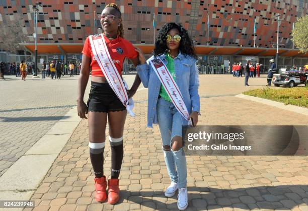 Fans arrive for the Carling Black Label Champion Cup match between Orlando Pirates and Kaizer Chiefs at FNB Stadium on July 29, 2017 in Johannesburg,...