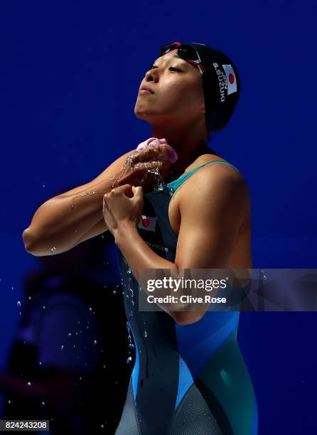 Satomi Suzuki of Japan looks on during the Women's 50m Breaststroke semi final on day sixteen of the Budapest 2017 FINA World Championships on July...