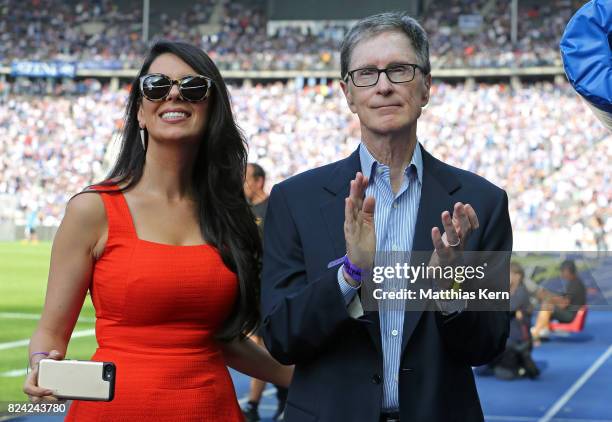 Club owner John Henry of Liverpool and his wife Linda Pizutti look on prior to the pre season friendly match between Hertha BSC and FC Liverpool at...