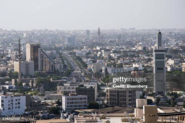 The Grande Mosque de Dakar, right, and the Central Bank of West African States , left, stand among residential buildings in Dakar, Senegal, on...
