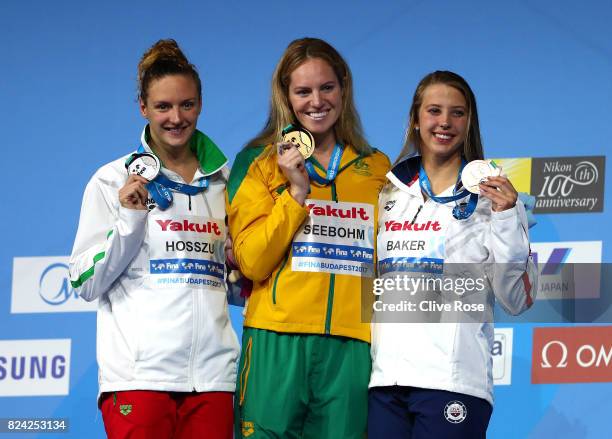 Silver medalist Katinka Hosszu of Hungary, gold medalist Emily Seebohm of Australia and bronze medalist Kathleen Baker of the United States pose with...