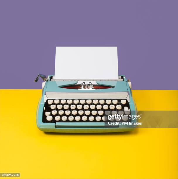 manual typewriter with blank paper - typewriter stock pictures, royalty-free photos & images