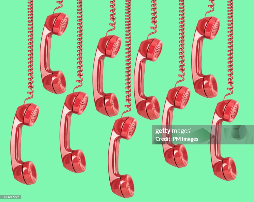 9 red telephone receivers