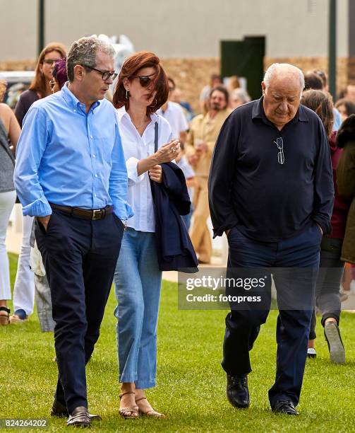 Pablo Isla with his wife Maria de la Vega and Amancio Ortega attend during CSI Casas Novas Horse Jumping Competition on July 29, 2017 in A Coruna,...