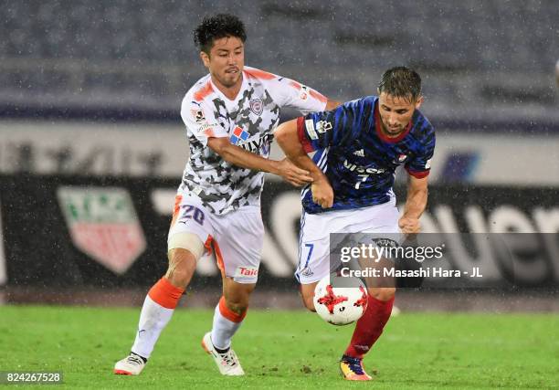 Hugo Vieira of Yokohama F.Marinos and Ryo Takeuchi of Shimizu S-Pulse during the J.League J1 match between Yokohama F.Marinos and Shimizu S-Pulse at...