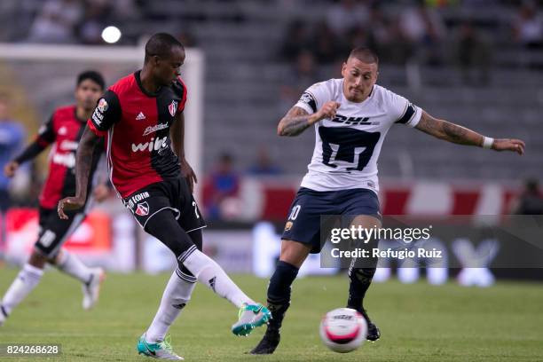 Jaine Barreiro of Atlas fights for the ball with Nicolas Castillo of Pumas during the 2nd round match between Atlas and Pumas UNAM as part of the...