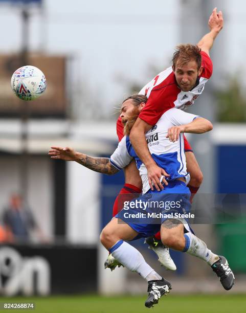 Craig Dawson of West Bromwich Albion challenges Stuart Sinclair of Bristol Rovers during the pre season match between Bristol Rovers and West...