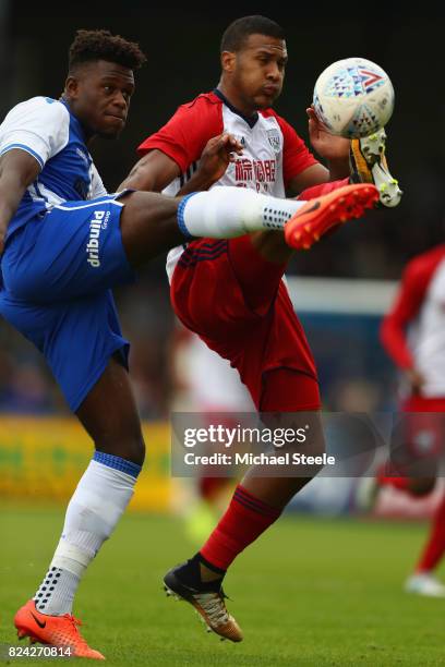 Solomon Rondon of West Bromwich Albion challenges Rollin Menayese of Bristol Rovers during the pre season match between Bristol Rovers and West...