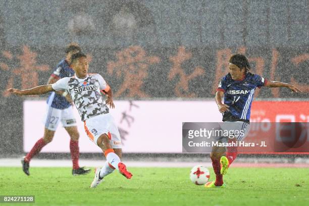 Chong Tese of Shimizu S-Pulse and Jun Amano of Yokohama F.Marinos compete for the ball during the J.League J1 match between Yokohama F.Marinos and...