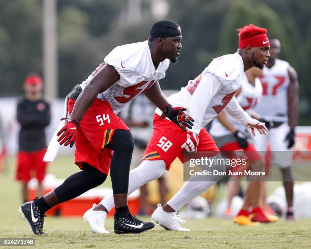 Linebackers Lavonte David and Kwon Alexander of the Tampa Bay Buccaneers works out during Training Camp at One Buc Place on July 29, 2017 in Tampa,...