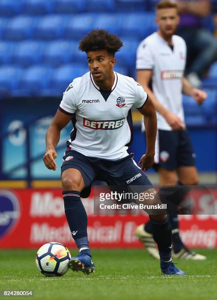 Derik Osede of Bolton Wanderers in action during the pre season friendly match between Bolton Wanderers and Stoke City at Macron Stadium on July 29,...