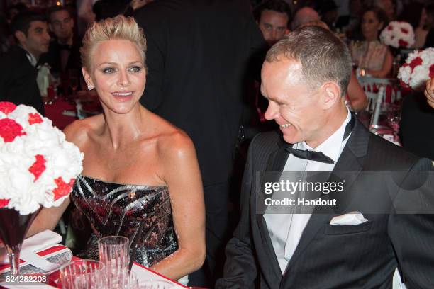 Princess Charlene of Monaco and Christopher Froome attend the 69th Monaco Red Cross Ball Gala at Sporting Monte-Carlo on July 28, 2017 in...