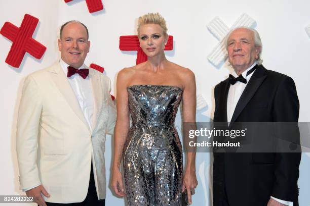 Prince Albert II of Monaco, Princess Charlene of Monaco and Pino Pinelli attend the 69th Monaco Red Cross Ball Gala at Sporting Monte-Carlo on July...