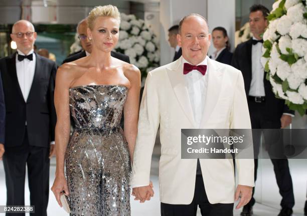 Princess Charlene of Monaco and Prince Albert II of Monaco attend the 69th Monaco Red Cross Ball Gala at Sporting Monte-Carlo on July 28, 2017 in...