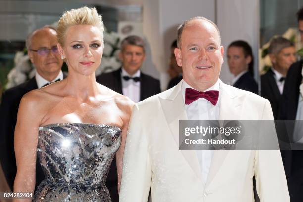 Princess Charlene of Monaco and Prince Albert II of Monaco attend the 69th Monaco Red Cross Ball Gala at Sporting Monte-Carlo on July 28, 2017 in...