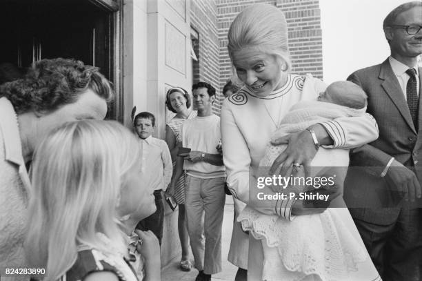 Duchess of Kent leaves King's College Hospital with her newborn Nicholas, London, UK, 31st July 1970.