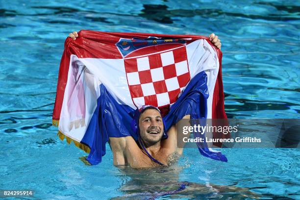 Andelo Setka of Croatia celebrates victory during the Men's Waterpolo Final between Hungary and Croatia on day sixteen of the Budapest 2017 FINA...