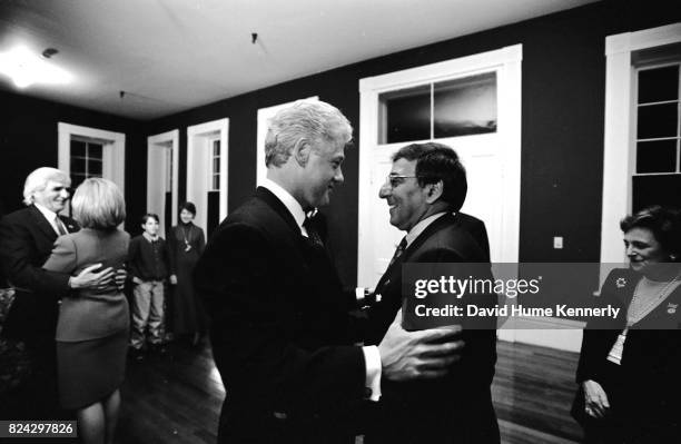 President Bill Clinton talks with White House Chief of Staff Leon Panetta on election night backstage at the Old State House, Little Rock, Arkansas,...