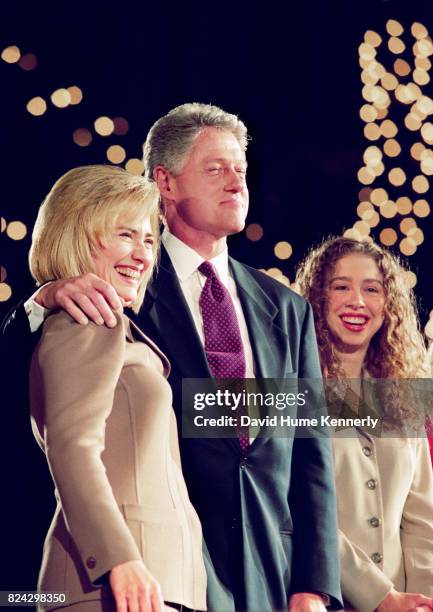 President Bill Clinton, First Lady Hillary Clinton, and Chelsea Clinton, celebrate his victory on election night at the Old State House, Little Rock,...