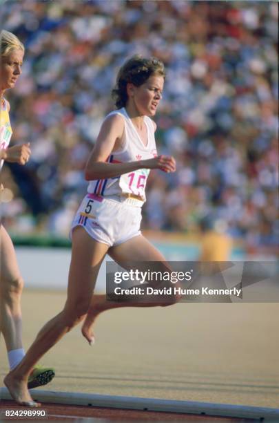 Zola Budd, barefoot runner, competes for Great Britain during the 3,000-meter women's track and field final at the Los Angeles Memorial Coliseum...