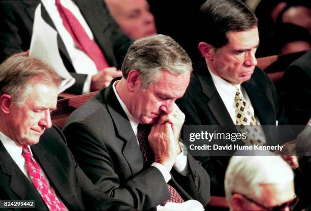 Lawmakers listen to President Bill Clinton's State of the Union Speech before a joint session of Congress, Washington DC, January 19, 1999.