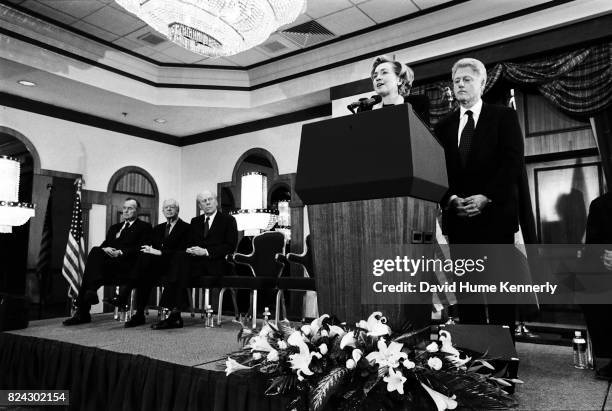 Former Presidents George HW Bush, Jimmy Carter, Gerald Ford, and President Bill Clinton with the First Lady Hillary Clinton at a memorial service for...