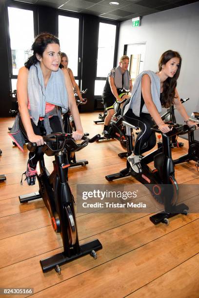 Mariella Ahrens and her daughter Isabella Ahrens train during the Cyberobics Women Club Opening on July 29, 2017 in Berlin, Germany.