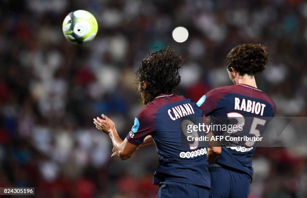 Paris Saint-Germain's French midfielder Adrien Rabiot heads the ball and scores a goal during the French Trophy of Champions football match between...