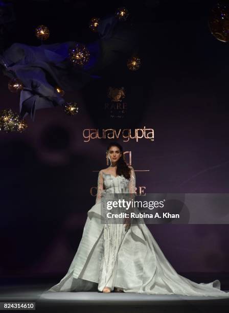 Bollywood actor Aditi Rao Hydari walks for Gaurav Gupta at FDCI's India Couture Week 2017 at the Taj Palace hotel on July 29, 2017 in New Delhi,...