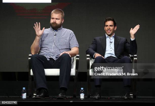 Robert Kirkman and Eli Roth speak onstage at AMC Visionaries: Robert Kirkman's Secret History of Comics during the AMC portion of the 2017 Summer...