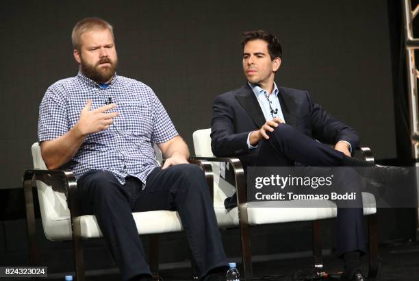 Writer Robert Kirkman and director Eli Roth of 'Visionaries: Robert Kirkman's Secret History of Comics Docuseries' speak onstage during the...