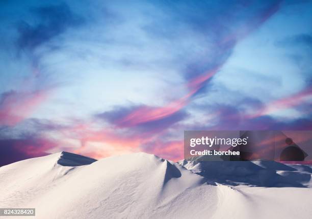 winter sunset in the mountains - snow hill stock pictures, royalty-free photos & images