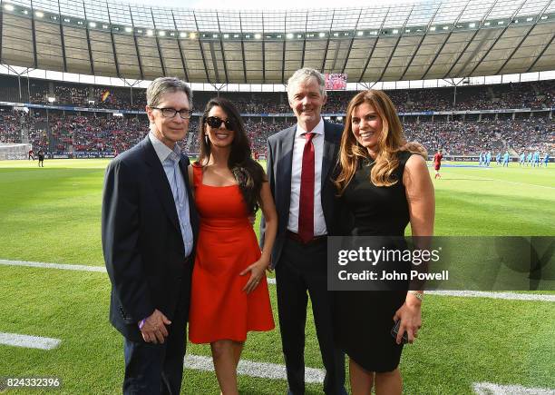 Owners of Liverpool FC John W Henry and Linda Pizzuti Henry with their friends Wendy and David Dobson before the preseason friendly match between...