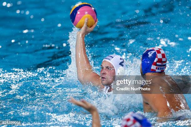 Luka Loncar and Bela Torok of Hungary in action during the Men's Waterpolo Final between Hungary and Croatia on day sixteen of the Budapest 2017 FINA...