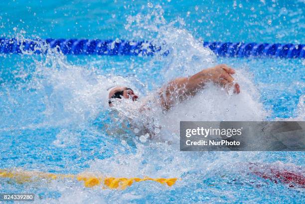 Tomasz Polewka competes in a heat of the men's 50m backstroke during the swimming competition at the 2017 FINA World Championships in Budapest, on...