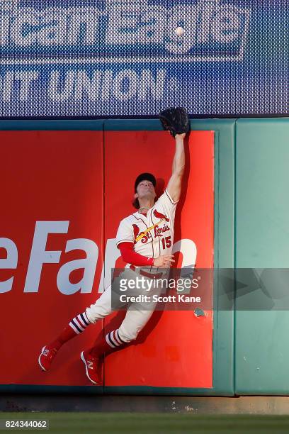 Randal Grichuk of the St. Louis Cardinals is unable to catch a two-run home run ball hit by Paul Goldschmidt of the Arizona Diamondbacks during the...
