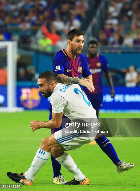 Lionel Messi of Barcelona controls the ball against Daniel Carvajal of Real Madrid in the first half during their International Champions Cup 2017...