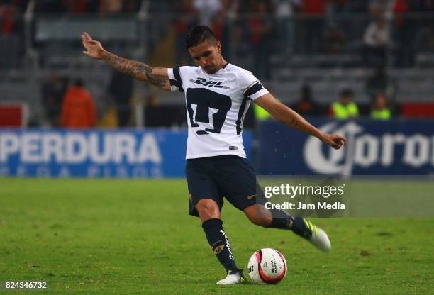 David Cabrera of Pumas takes a shot during the 2nd round match between Atlas and Pumas as part of the Torneo Apertura 2017 Liga MX at Jalisco Stadium...
