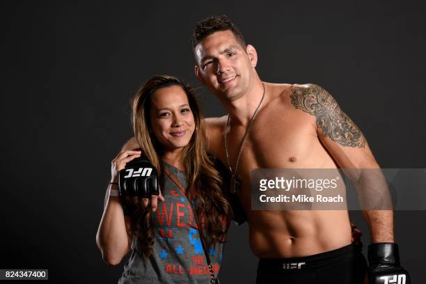 Chris Weidman and his wife Marivi Weidman pose for a post fight portrait backstage during the UFC Fight Night event inside the Nassau Veterans...