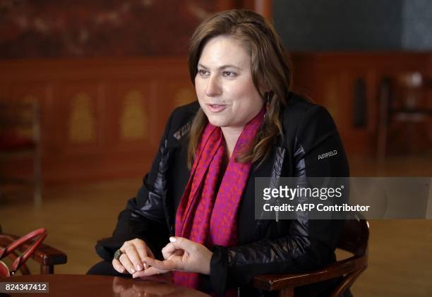 Hungarian chess Olympic winner Judit Polgar answers AFP's questions during an interview with her father, the Hungarian chess teacher and educational...