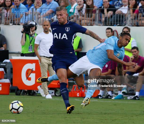 Toby Alderweireld of Tottenham knocks Danilo of Manchester City to the ground during the first half of the 2017 International Champions Cup Presented...