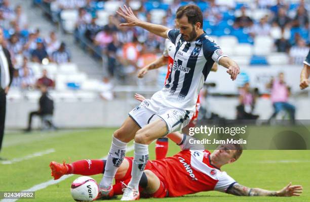 Jose Maria Basanta of Monterrey fights for the ball with Martin Bravo of Veracruz during the 2nd round match between Monterrey and Veracruz as part...