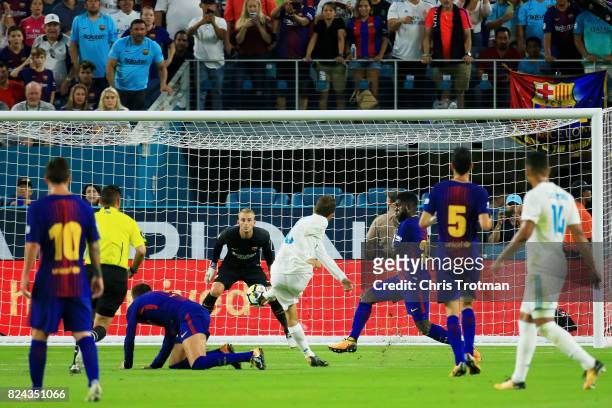 Nacho Fernandez of Real Madrid scores a goal in the first half against Barcelona during their International Champions Cup 2017 match at Hard Rock...