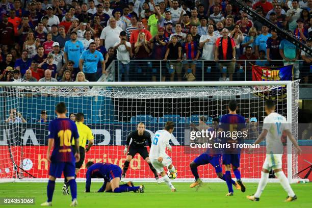 Nacho Fernandez of Real Madrid scores a goal in the first half against Barcelona during their International Champions Cup 2017 match at Hard Rock...