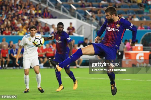 Gerard Pique of Barcelona scores a goal in the second half against Real Madrid during their International Champions Cup 2017 match at Hard Rock...