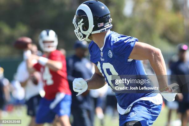 Cooper Kupp of the Los Angeles Rams looks for the pass from Sean Mannion during the first day of Training Camp at Crawford Field on July 29, 2017 in...